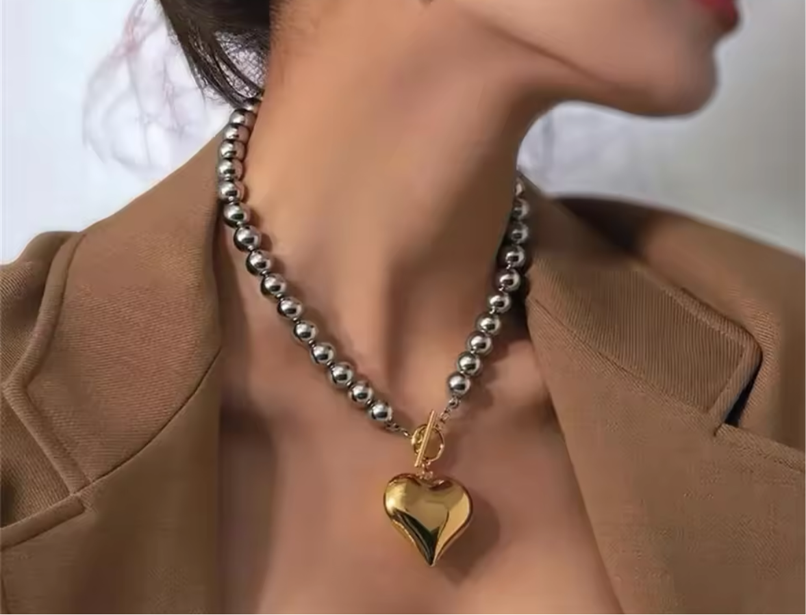 Corazón oro y plata